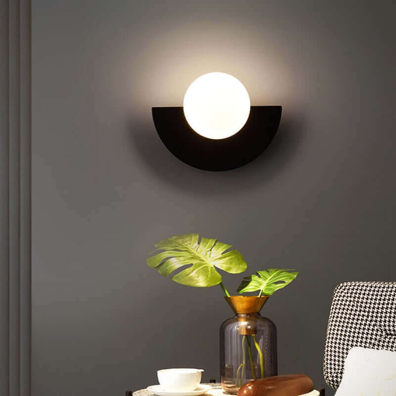 Halfmoon Metal Sconce. Comes in 2 different sizes and various colours.